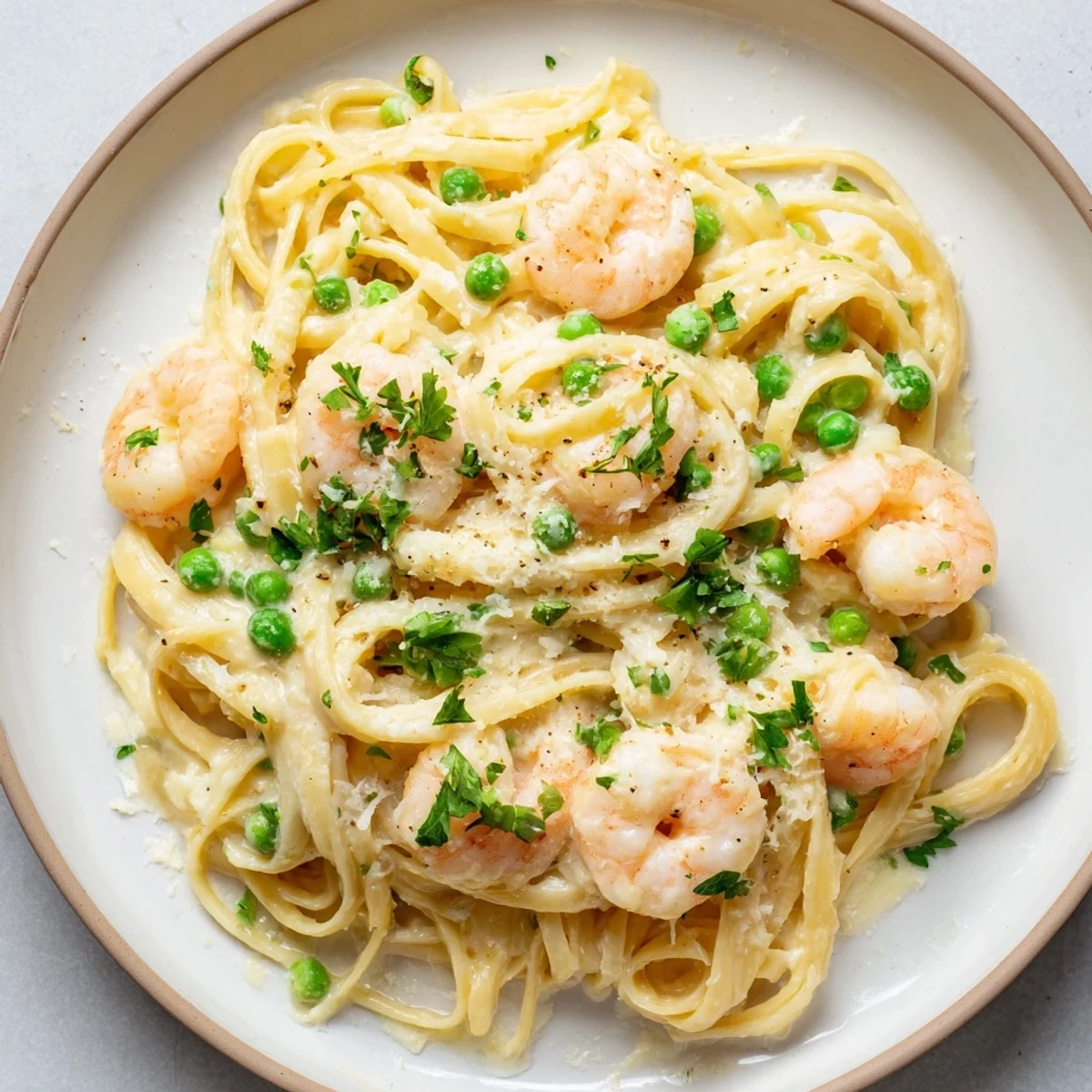 Instant Pot Shrimp Alfredo Pasta, creamy and savory, garnished with fresh parsley, ready to eat.