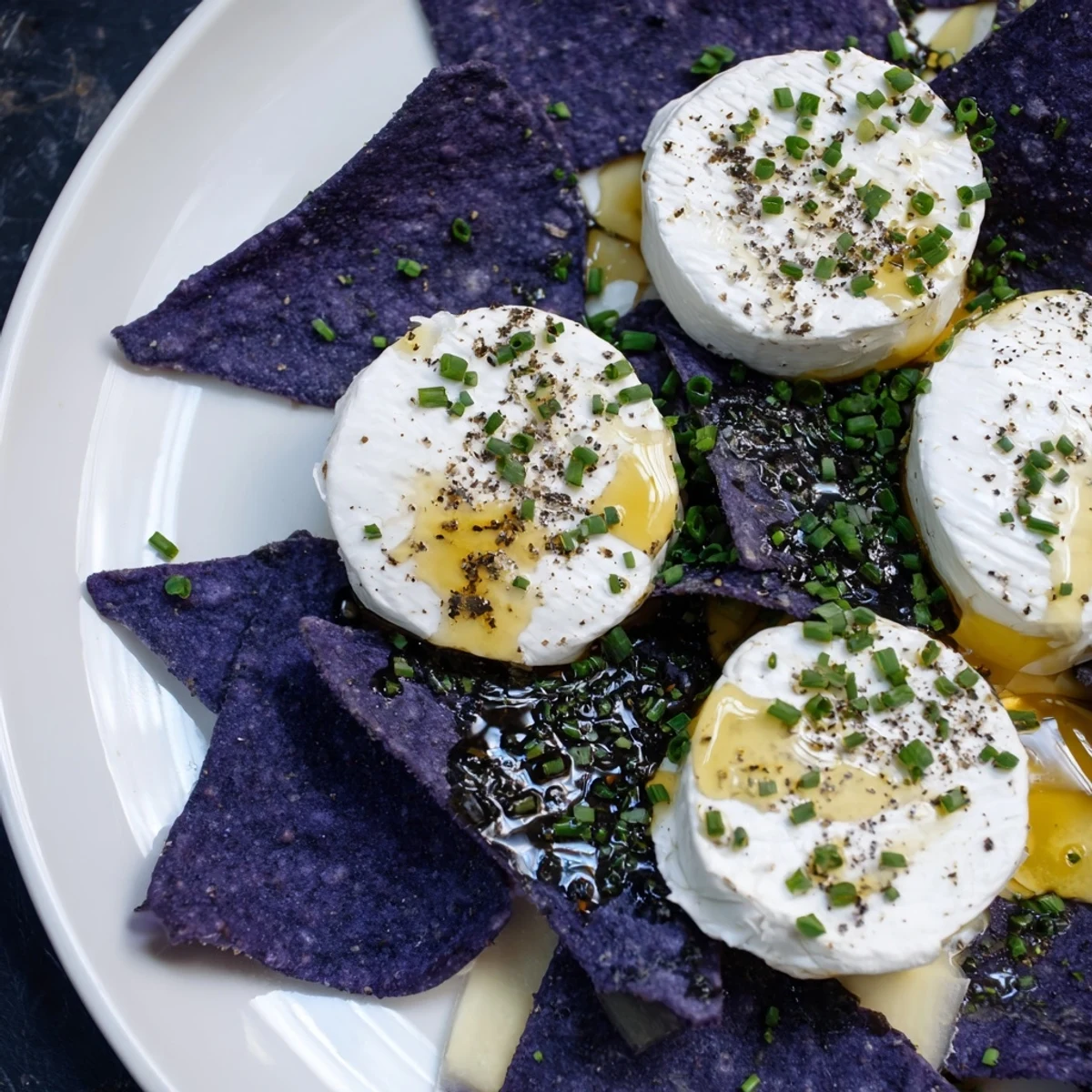 Colorful "Stepping Stones" appetizer arrangement: cheeses pathing across a river of blue corn chips beautifully.