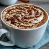Cozy Adaptogens Latte, a frothy vegan treat with earthy mushroom notes.