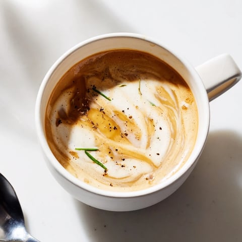 Savor the rich Onion Latte topped with frothy milk and caramelized sweetness.  