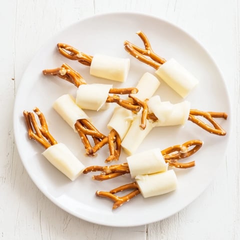 String cheese and pretzel rods snack, a simple, delicious, and fun treat ready in minutes.