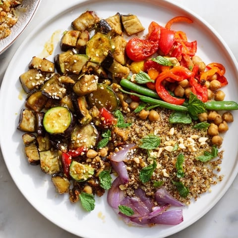 Vibrant photo showcases The Spice Route, a global vegetarian dish bursting with colorful vegetables.