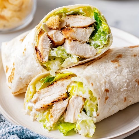 Grilled chicken, romaine lettuce, and creamy Caesar dressing wrapped in a soft flour tortilla.