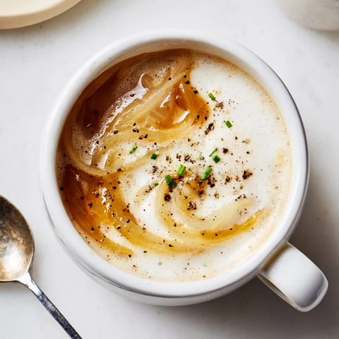 Experience the unique flavors of Onion Latte, blending espresso with savory caramelized onions.  