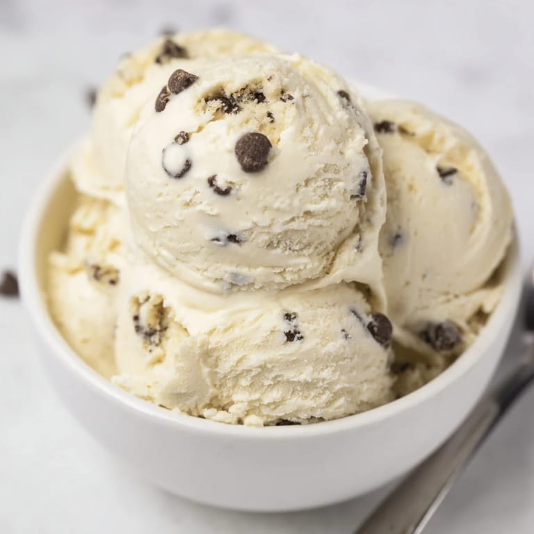Whipped cottage cheese ice cream topped with rich chocolate chip cookie dough treats.