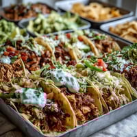 Cinco de Mayo Taco Bar Spread with colorful toppings and fresh tortillas arranged for festive celebration.
